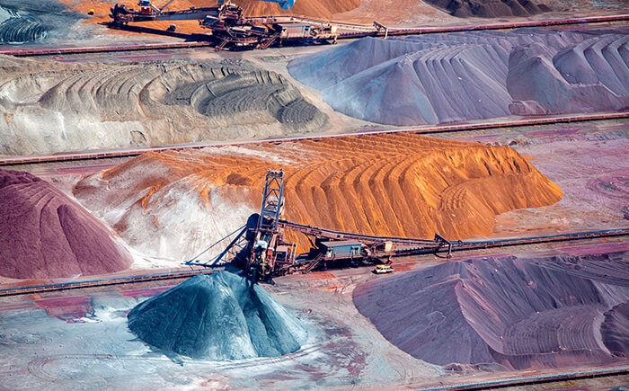 Aerial view of industrial mining consulting ore and conveyor belt 