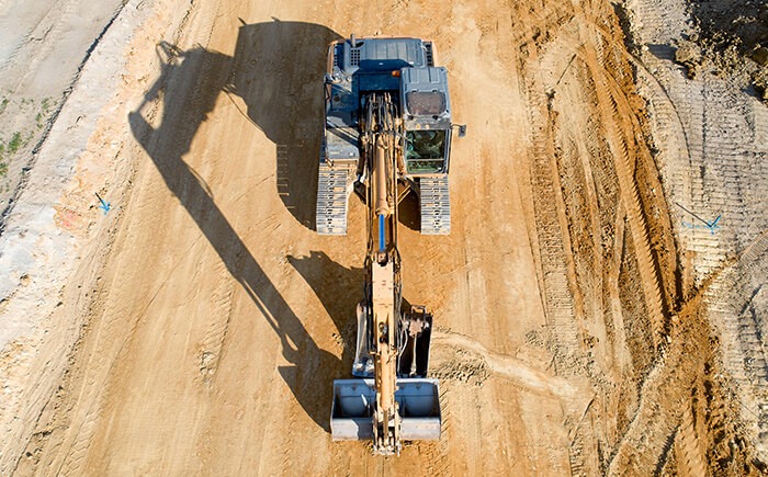 Aerial view of equipment in use at construction remediation site 