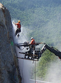 Two environmental and geotechnical engineers completing rock slope project