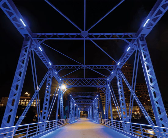 Grand Rapids bridge reflecting at night.