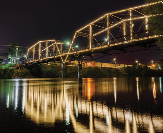 Missoula bridge lit up at night.